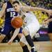 Michigan senior Stu Douglass looks after a loose ball in the second half against Northwestern at Crisler Center on Wedensday. Melanie Maxwell I AnnArbor.com